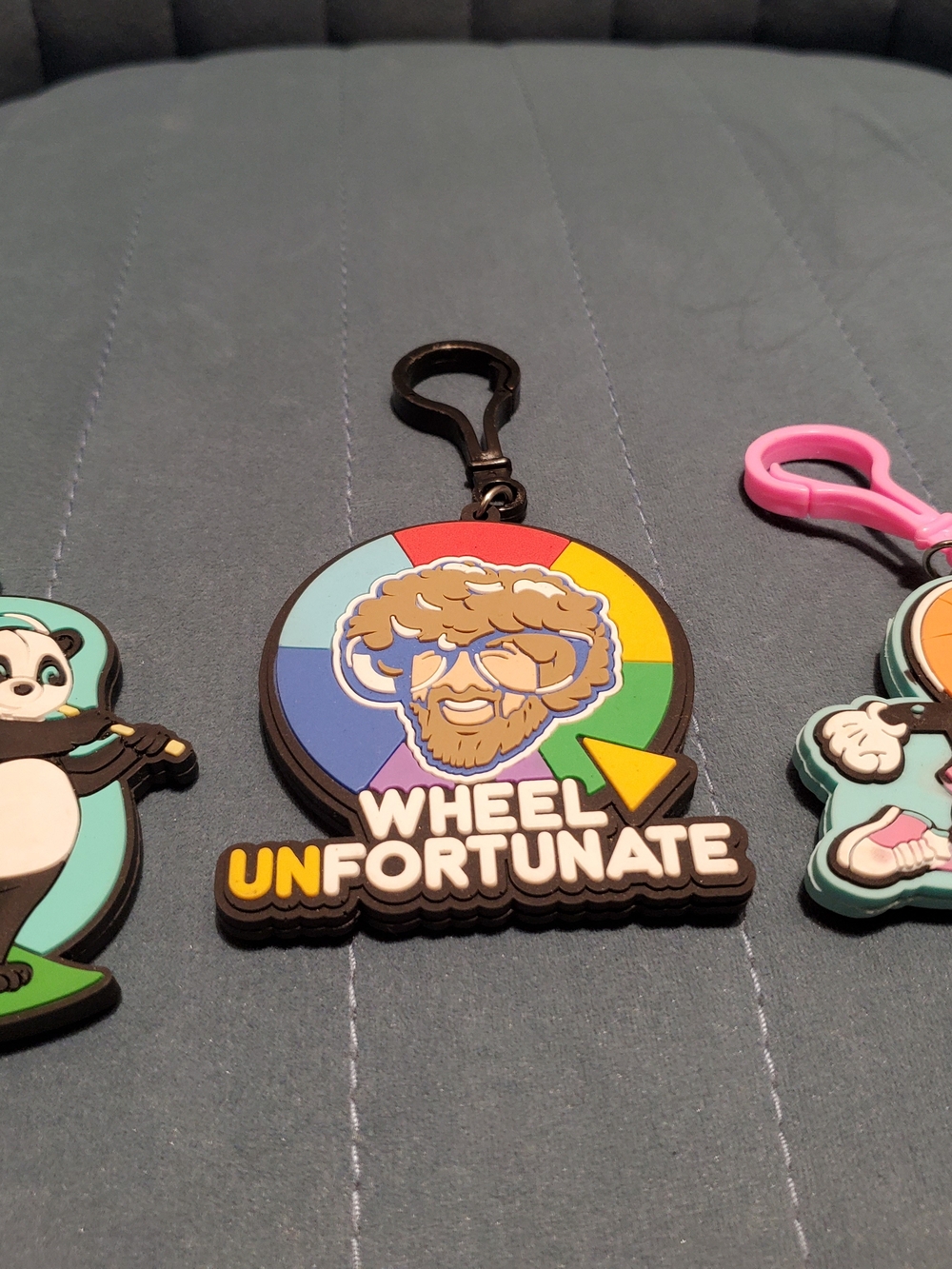 Wheel Unfortunate Rubber Keychain - Multicolor Wheel Design